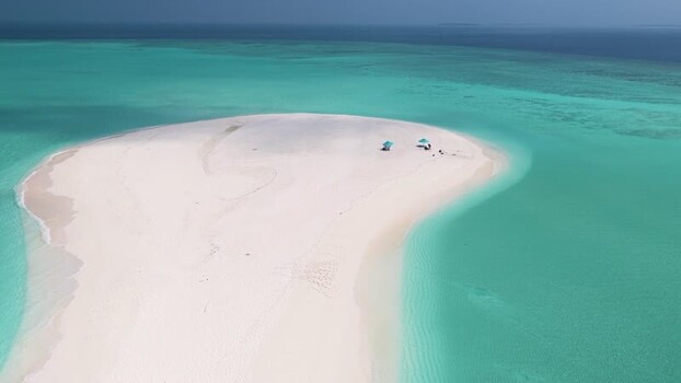 Aerial view of a white sandbank in turquoise water Maldives. Aerial view of a white sandbank in turquoise water Maldives.