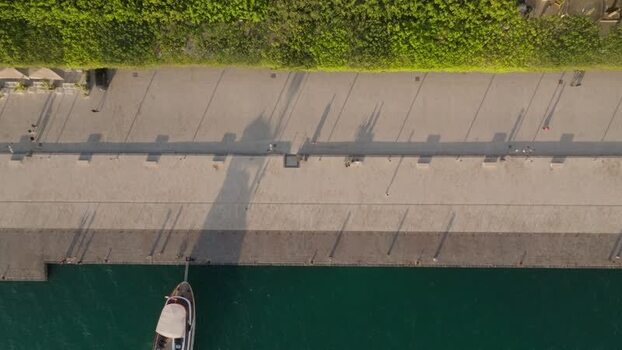 Aerial view of the Island of Ortigia waterfront with people Italy.