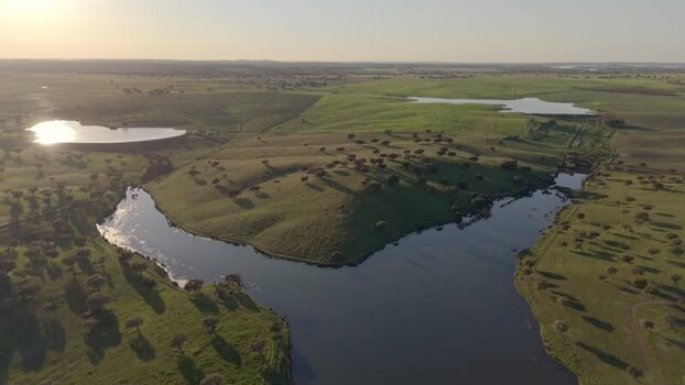 Aerial view of a winding river and green hills Portugal. Aerial view of a winding river and green hills Portugal.