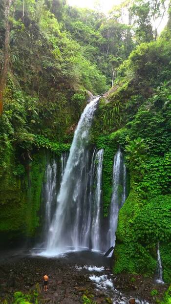 Aerial view of Tiu Kelep Waterfall in the jungle Indonesia.