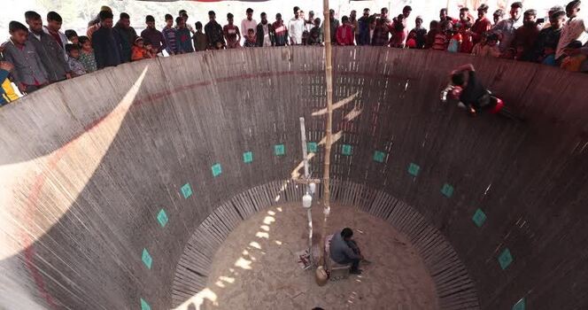 View of a motorcycle stuntman in the Well of Death Bangladesh.
