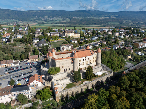 Aerial view of the historic medieval Chateau de Grandson with its stone walls and towers in Grandson Vaud Switzerland.