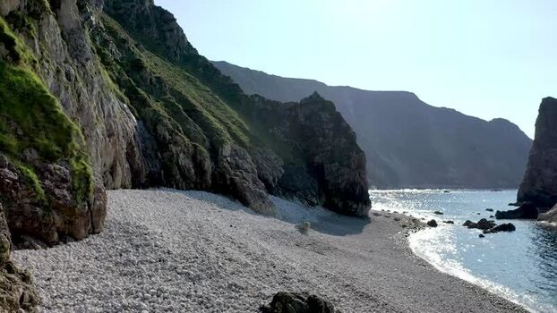 Aerial view of Glenlough Bay and rocky coastline Ireland.