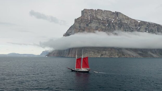 Aerial view of Storoen and sailboat in Avannaata Greenland. Aerial view of Storoen and sailboat in Avannaata Greenland.
