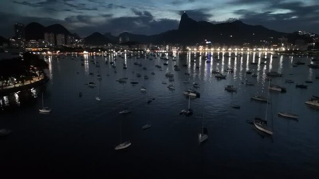 Aerial view of Botafogo Bay at night with sailboats Brazil. Aerial view of Botafogo Bay at night with sailboats Brazil.