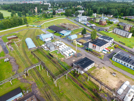 Olaine parish Olaine Municipality Latvia 04 July 2026 Aerial view of an industrial site with storage tanks railway tracks and pipelines amidst green vegetation. Olaine parish Olaine Municipality Latvia 04 July 2026 Aerial view of an industrial site with storage tanks railway tracks and pipelines amidst green vegetation.