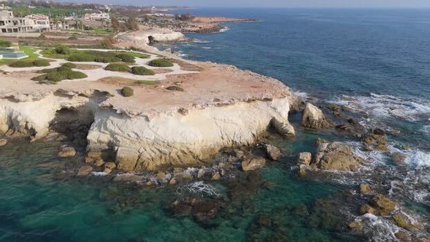 Aerial view of rocky coastline and turquoise sea Cyprus.