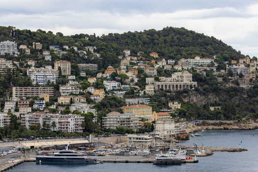 Aerial view of the harbor with yachts and residential buildings on the hillside in Nice Provence Alpes Cote d Azur France. Aerial view of the harbor with yachts and residential buildings on the hillside in Nice Provence Alpes Cote d Azur France.