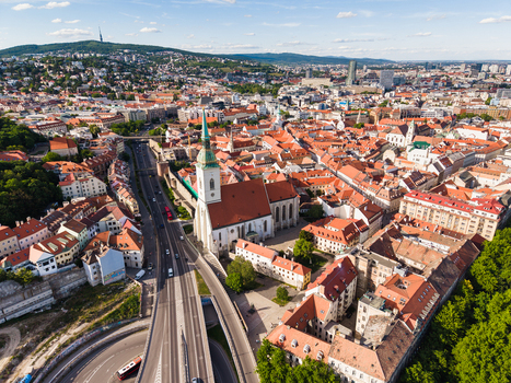 Aerial view of St. Martin s Cathedral and the historic old town with red rooftops and the Kamzik TV Tower on the horizon in Bratislava Bratislava Region Slovakia. Aerial view of St. Martin s Cathedral and the historic old town with red rooftops and the Kamzik TV Tower on the horizon in Bratislava Bratislava Region Slovakia.