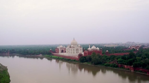 Aerial view of Taj Mahal by the Yamuna River in Agra India. Aerial view of Taj Mahal by the Yamuna River in Agra India.