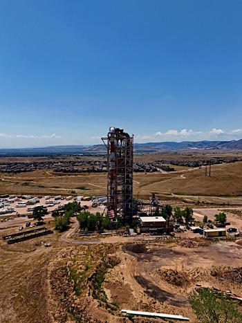Aerial view of the historic Leyden coal mine industrial tower surrounded by suburban housing and rolling hills in Jefferson County Colorado United States. Aerial view of the historic Leyden coal mine industrial tower surrounded by suburban housing and rolling hills in Jefferson County Colorado United States.