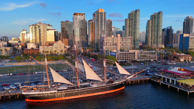 San Diego United States 01 April 2026 Aerial view of the historic Star of India tall ship docked at the North Embarcadero with the San Diego skyline in the background.