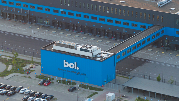 Waalwijk Netherlands 09 May 2026 Aerial view of the Bol. distribution center featuring its distinctive blue facade loading docks and surrounding parking area. Waalwijk Netherlands 09 May 2026 Aerial view of the Bol. distribution center featuring its distinctive blue facade loading docks and surrounding parking area.