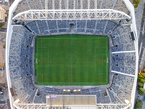 Aerial view of Bloomfield Stadium with its vibrant green soccer pitch and tiered seating surrounded by urban infrastructure in Tel Aviv Yafo Tel Aviv District Israel. Aerial view of Bloomfield Stadium with its vibrant green soccer pitch and tiered seating surrounded by urban infrastructure in Tel Aviv Yafo Tel Aviv District Israel.