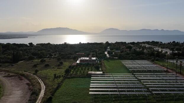 Aerial view of solar farm near the coast Italy.