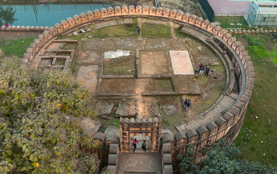 Aerial view of the Idrakpur Fort s circular structure its aged brickwork contrasting with the surrounding verdant foliage Munshiganj Dhaka Division Bangladesh. Aerial view of the Idrakpur Fort s circular structure its aged brickwork contrasting with the surrounding verdant foliage Munshiganj Dhaka Division Bangladesh.