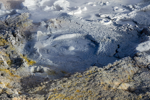 View of Geisers Sol de la Manana with bubbling mud pools and steaming geothermal activity in the volcanic landscape of Sur Lipez Potosi Department Bolivia. View of Geisers Sol de la Manana with bubbling mud pools and steaming geothermal activity in the volcanic landscape of Sur Lipez Potosi Department Bolivia.