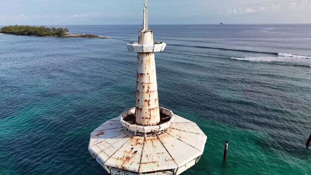 Aerial view of the historic lighthouse in the sea The Bahamas.