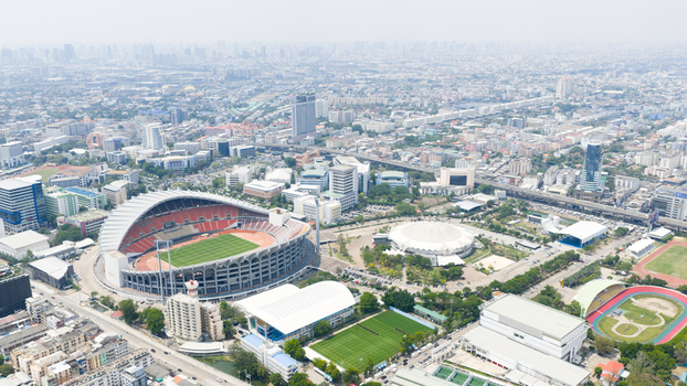 Aerial view of Rajamangala National Stadium surrounded by urban infrastructure roads and sports facilities in Krung Thep Maha Nakho Thailand. Aerial view of Rajamangala National Stadium surrounded by urban infrastructure roads and sports facilities in Krung Thep Maha Nakho Thailand.