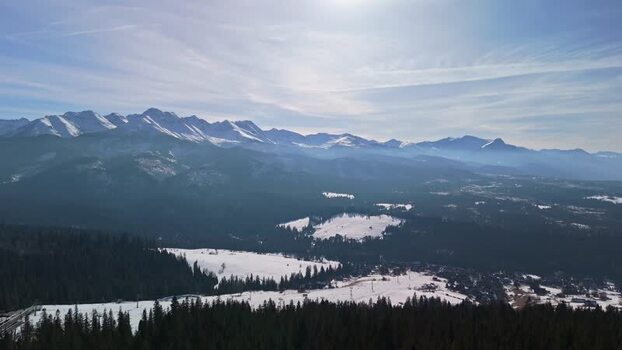 Aerial view of Male Ciche ski resort snowy Tatras under clear winter sky Aerial view of Male Ciche ski resort snowy Tatras under clear winter sky