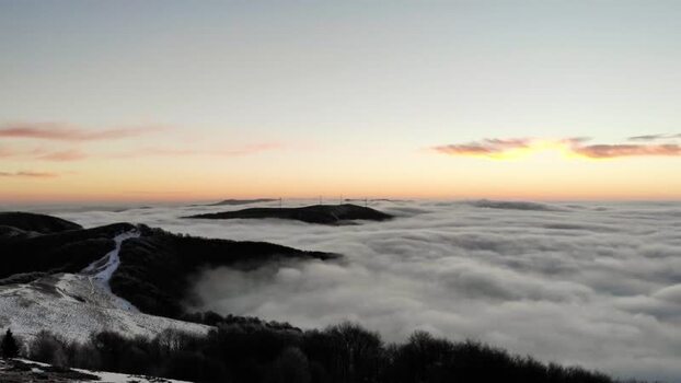 Aerial view of Balkan Mountains above clouds Bulgaria.