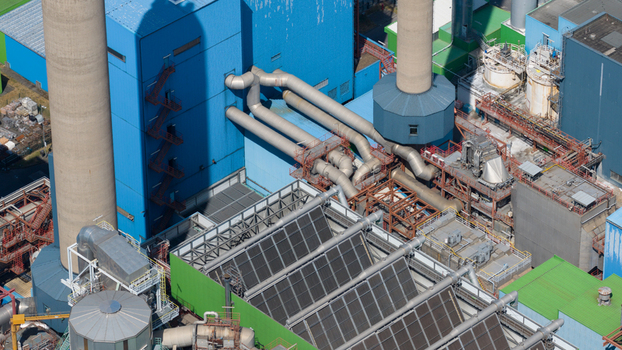 Aerial view of the Abfallkraftwerk Herten waste to energy plant with complex industrial piping chimneys and metal structures Herten Nordrhein Westfalen Germany.