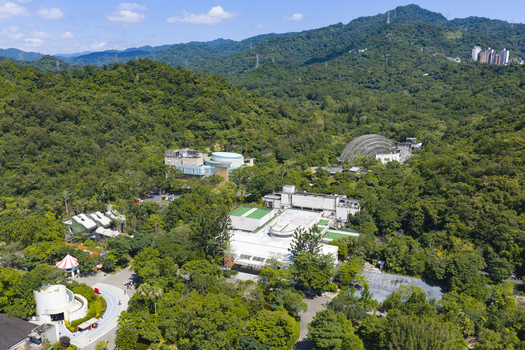 Aerial view of the Taipei Zoo nestled within lush green hills and dense forest in Taipei City Taiwan. Aerial view of the Taipei Zoo nestled within lush green hills and dense forest in Taipei City Taiwan.