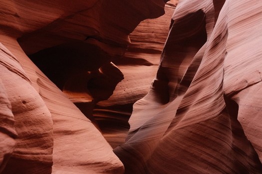 View of Antelope Canyon with smooth wavy sandstone walls and narrow slot canyon passages in Coconino County Arizona United States.