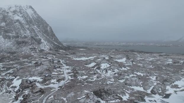 Aerial view of snowy Lofoten mountains and landscape Norway.