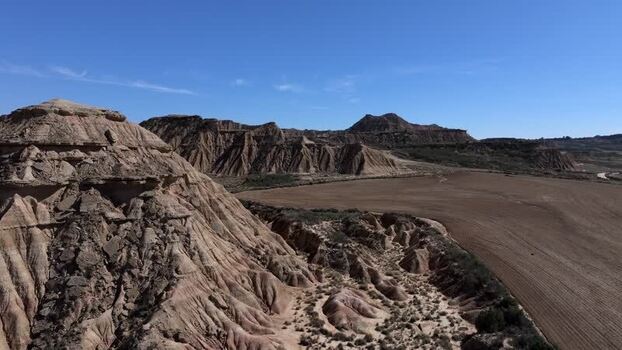 Aerial view of Bardenas Reales desert landscape in Spain.