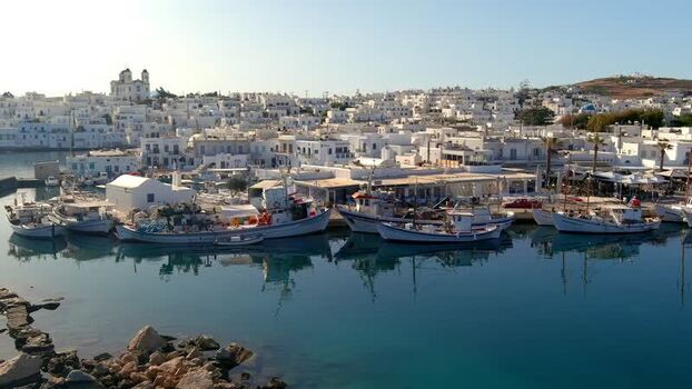 Aerial view of Naoussa harbor with fishing boats in Greece. Aerial view of Naoussa harbor with fishing boats in Greece.