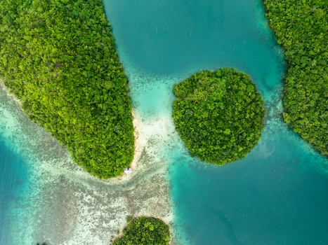 Aerial view of Bucas Grande islands surrounded by turquoise water and coral reefs in Siargao Philippines. Aerial view of Bucas Grande islands surrounded by turquoise water and coral reefs in Siargao Philippines.