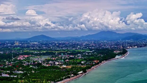 Aerial view of the Bali coastline with mountains Indonesia.