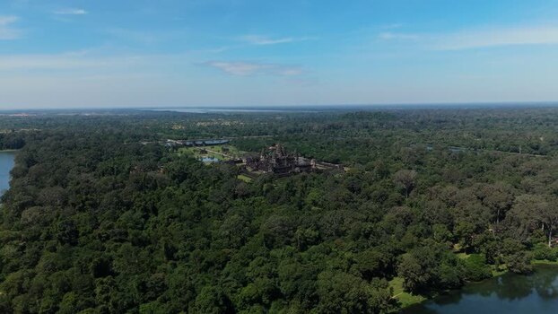 Aerial view of Angkor Wat temple complex in Cambodia. Aerial view of Angkor Wat temple complex in Cambodia.