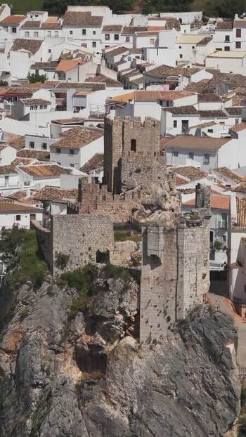 Aerial view of Castillo de Zuheros and white houses Spain.