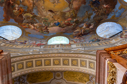 Wien Austria 26 April 2026 View of the ornate baroque ceiling fresco of the Austrian National Library with classical paintings and golden architectural details. Wien Austria 26 April 2026 View of the ornate baroque ceiling fresco of the Austrian National Library with classical paintings and golden architectural details.