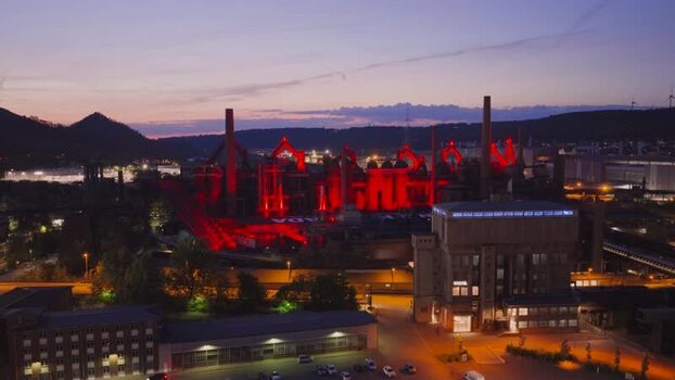 Aerial view of Volklingen Ironworks illuminated in red Germany. Aerial view of Volklingen Ironworks illuminated in red Germany.