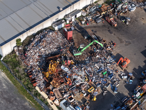 Melbourne VIC Australia 22 September 2026 Aerial view of a scrap metal recycling facility in Kilsyth with piles of sorted metal heavy machinery and industrial equipment. Melbourne VIC Australia 22 September 2026 Aerial view of a scrap metal recycling facility in Kilsyth with piles of sorted metal heavy machinery and industrial equipment.