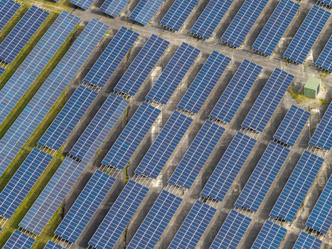 Aerial view of Former Military Airfield Preschen solar farm with rows of solar panels installed over the historic runway and taxiway in Neisse Malxetal Brandenburg Germany. Aerial view of Former Military Airfield Preschen solar farm with rows of solar panels installed over the historic runway and taxiway in Neisse Malxetal Brandenburg Germany.