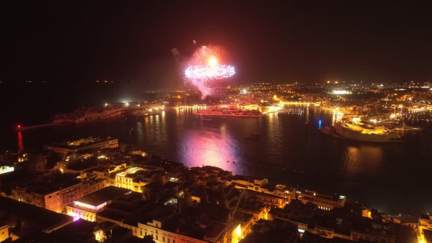 Aerial view of fireworks illuminating the night sky over the Grand Harbour in Valletta Port Region Malta. Aerial view of fireworks illuminating the night sky over the Grand Harbour in Valletta Port Region Malta.