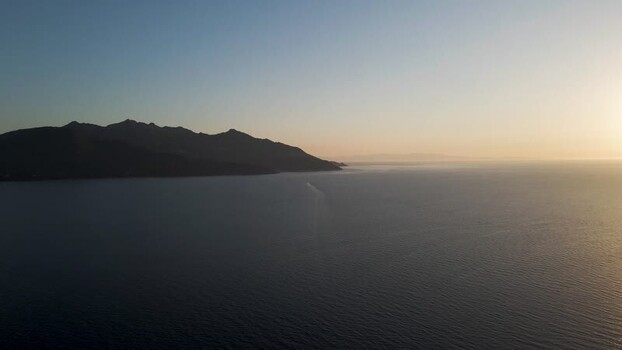 Aerial View of the coastline at sunset Elba Island Tuscany Italy.