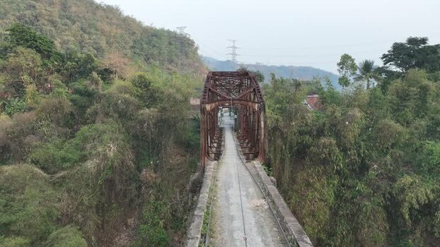 Aerial view of old rusty metal bridge in Soreang Indonesia. Aerial view of old rusty metal bridge in Soreang Indonesia.