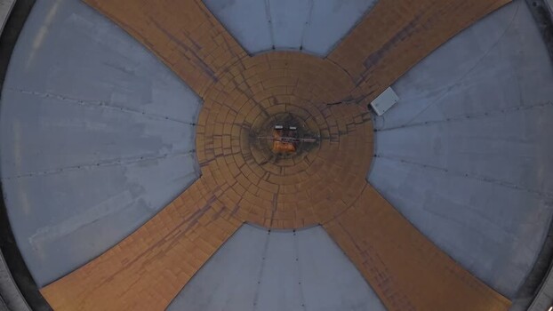 Aerial view of a circular modern building roof in Tirane Albania.