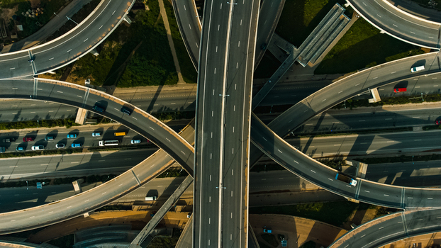 Aerial view of Pokuase Interchange with multi level flyovers curved ramps and traffic on asphalt roads in Ga North Municipal Greater Accra Region Ghana. Aerial view of Pokuase Interchange with multi level flyovers curved ramps and traffic on asphalt roads in Ga North Municipal Greater Accra Region Ghana.