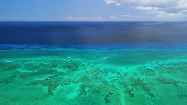 Aerial view of Grand Cayman reef and turquoise sea Cayman Islands. Aerial view of Grand Cayman reef and turquoise sea Cayman Islands.