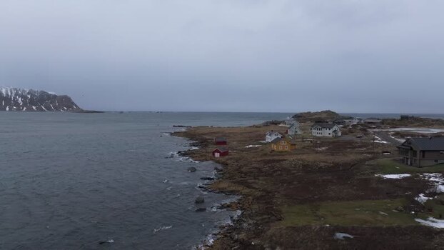 Aerial view of Lofoten coastline with traditional houses Norway.