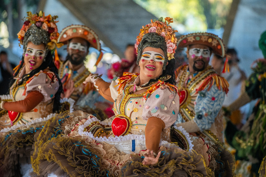 Rio de Janeiro Rio de Janeiro Brazil 20 June 2026 View of performers in colorful Festa Junina costumes with floral headpieces and heart shaped details dancing at a festival. Rio de Janeiro Rio de Janeiro Brazil 20 June 2026 View of performers in colorful Festa Junina costumes with floral headpieces and heart shaped details dancing at a festival.