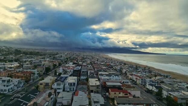 Aerial view of Los Angeles coastline and dramatic sky United States.