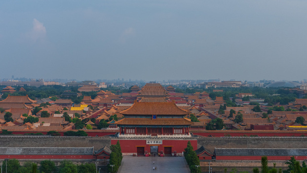 View of the Forbidden City with its iconic golden roofs traditional red walls and expansive courtyards under a clear sky in Beijing Beijing China. View of the Forbidden City with its iconic golden roofs traditional red walls and expansive courtyards under a clear sky in Beijing Beijing China.