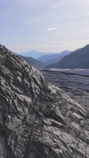 Aerial view of Aletsch Glacier and mountain peaks Switzerland.
